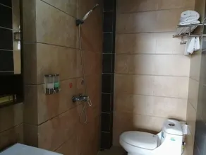 Xinglong Business Hotel - Image 5