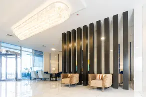 S Plaza Suites Hotel - Image 4