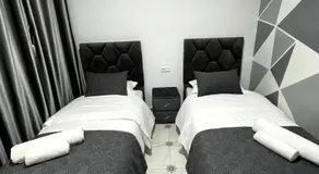 Top-Floor 2BR Bright & Cozy Tanger City Center - Image 2