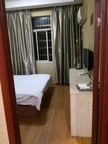 Chongren Laowu Business Hotel - Image 2