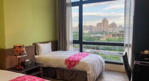 Sendale Zhubei Business Hotel - Image 2