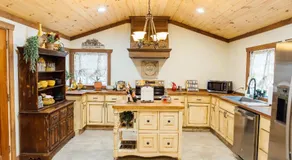 Villa Serena Tuscan Theme home with a HIDDEN lounge, fire pit, lawn games, creek - Image 3