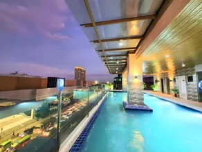 Cozy king bed with sofa bed Sunvida Tower Across SM Cebu with Balcony - Image 3