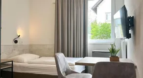 Longhouse Aparthotel - Image 2