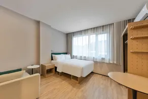 Dongguan Guomao Yuanyueli Youth Hotel - Image 2