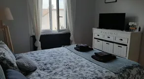 Chambre double dans maison chaleureuse et familiale - Image 2