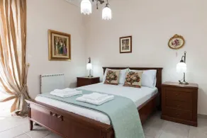 Sophisticated 2-Bedroom Retreat in Petroupoli - Image 2