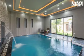 StayVista at The Binclave with Jacuzzi, Pvt Indoor Pool, Bar & Projector - Image 2