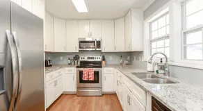 Sojourn Spacious Family Retreat with Fenced Backyard - Image 3