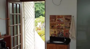 Casa Rosa da Ilha - Suíte com Ar-condicionado e Jardim Amplo - Image 4