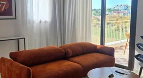 1BR Serviced Apt with Pool & Premium Amenities - Image 2
