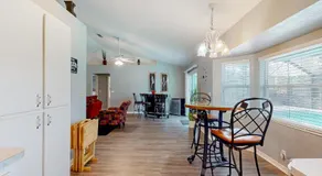 Spacious home with enclosed pool, open layout, washer/dryer, internet, & AC - Image 3