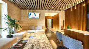 Cosy One-Bedroom Apartment in Mercury Tower by Zaha Hadid - Image 4