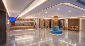 Manxin Hotel Qingdao Xindu - Image 3