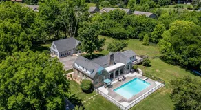 Tranquil Mountain Escape Luxurious 5-Bedroom Farmhouse with Pool - Image 5