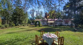 SaffronStays Milton Abbott Estate - 2BR colonial-era bungalow with garden, golf course views & bonfire nights near Ooty Golf Club - Image 5