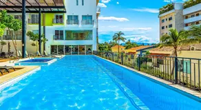 Bright coastal condo with pool access, private balcony & fast Wi-Fi - Image 3