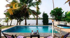 Glass River Retreat by Alaya Stays 4-BHK Riverside Getaway with Private Pool, Lakeside Sit-Out & Lounge Area Near Aluva Railway & Metro Station - Image 3