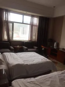 Huangnan Times Welcome Hotel - Image 2