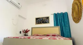 Divine Solace Luxury 2BHK near Triveni Sangam Prayagraj Kumbh Magh Mela Allahabad High Court AC WiFi Parking - Image 4