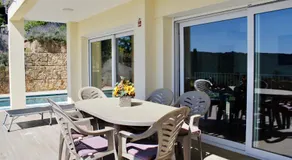 Agréable maison de vacances entièrement équipée avec piscine privée, internet haut débit et terrasse | Vue plage - Image 5