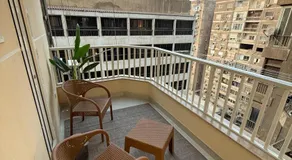 Zamalek 2BR Modern Stay - Partial Nile View - Image 3