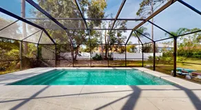 Spacious home with enclosed pool, open layout, washer/dryer, internet, & AC - Image 2