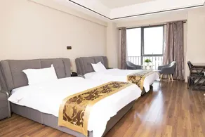 Buyiyang Apartment Hotel - Image 5