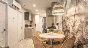 Modern 2BR Retreat with Parking & Gym Near Downtown & Airport - Image 2