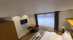 Grand near Etihad Stadium Coop Live - Image 2