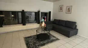 Modern 1BR and Sofa Bed Near Airport - Image 5