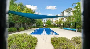 Tranquil 1-Bed Apartment with Courtyard Pool BBQ - Image 4