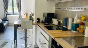 Belle Chambre Au fil de l'eau chambre d'hôte salon et cuisine partagés - Image 5