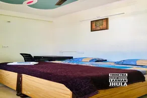 OYO HOME 84603 Trinetra Guest House - Image 4