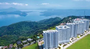 SMDC Wind - Panoramic View of Taal Lake and Greenery - Casa Nova Staycations - Image 3
