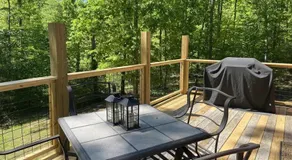 Gas fireplace, firepit, and cedar Adirondack chair - Image 5
