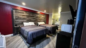 New American Inn and Suites  - Image 2