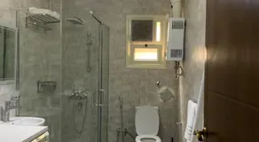 شقة فندقية بشارع جامعة الدول العربية - Image 4