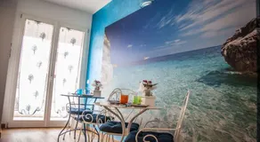 Blue Sea Rooms Apartment Cagliari - Image 4
