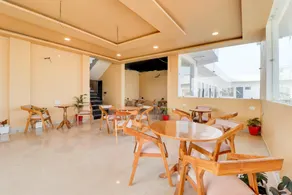 Hotel O by OYO VASAL BLISS Restaurant & Cafe - Image 2