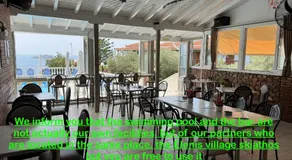 Valmas Village Apartments pool&bar - Image 3