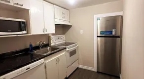 Cozy Comfort Stay Moncton - 2 Bedrooms with Kitchen and Parking - Image 4