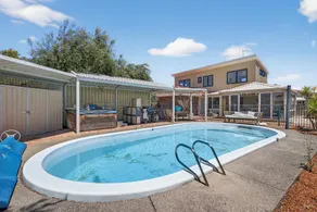 Coastal 2-Bed Home with Pool & Spa - Image 4