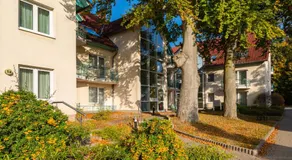 Ferienwohnung Möwe mit Balkon und einem Strandkorb im Sommer - Image 2