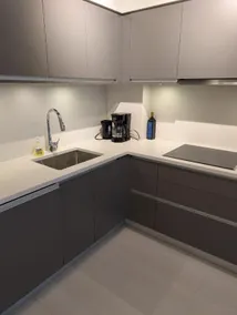 Modern 2 Bedroom Condo with AC and Parking - Image 4