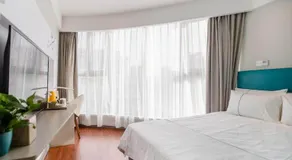 Magnotel Hotel Yangzhou Jinghua Wangyue Road - Image 2