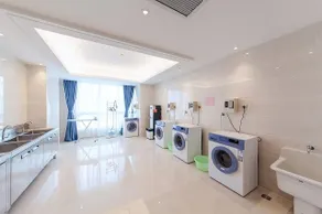 Suisse Place Apartment Hotel Taizhou Medical City - Image 4