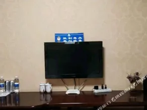 Linjiang Guanglong Business Hotel - Image 5