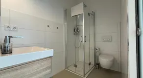 Ruhige Apartments mit guter Bahnanbindung und Küchennutzung - Image 4