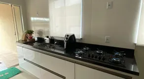 Apartamento em Poços - Varanda com Churrasqueira - Image 4